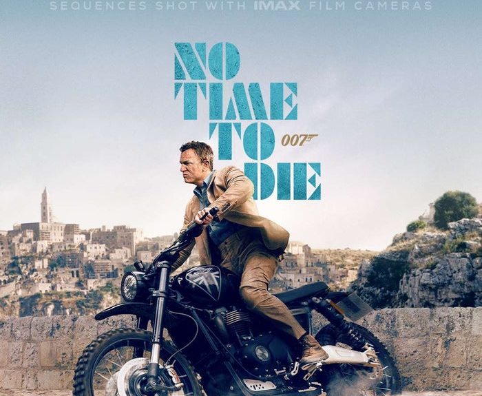 James Bond in sella a una moto sullo sfondo dei Sassi: è il nuovo poster di “No Time To Die” diffuso online dalla IMAX Corporation